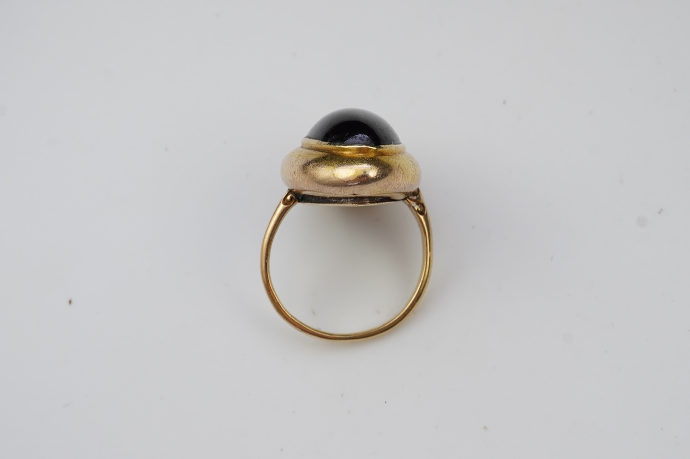 An unusual garnet locket ring, late 19th century composite